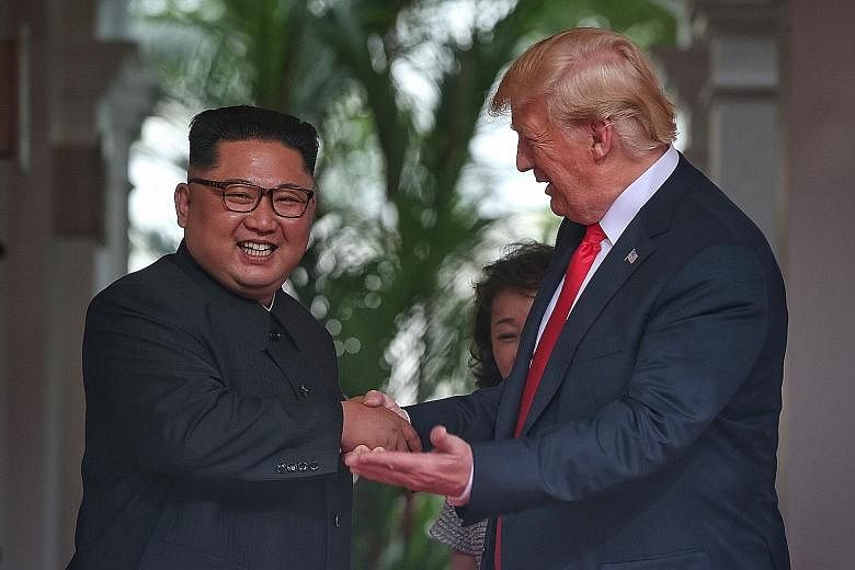 North Korean leader Kim Jong Un and US President Donald Trump at their first meeting in Singapore on June 12 last year.