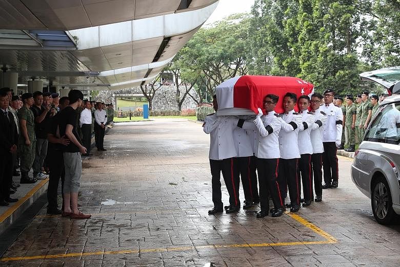 Singapore Armed Forces personnel carrying the coffin of actor Aloysius Pang into Mandai Crematorium last month. His death is the fifth training and operations-related death reported in the SAF since September 2017.