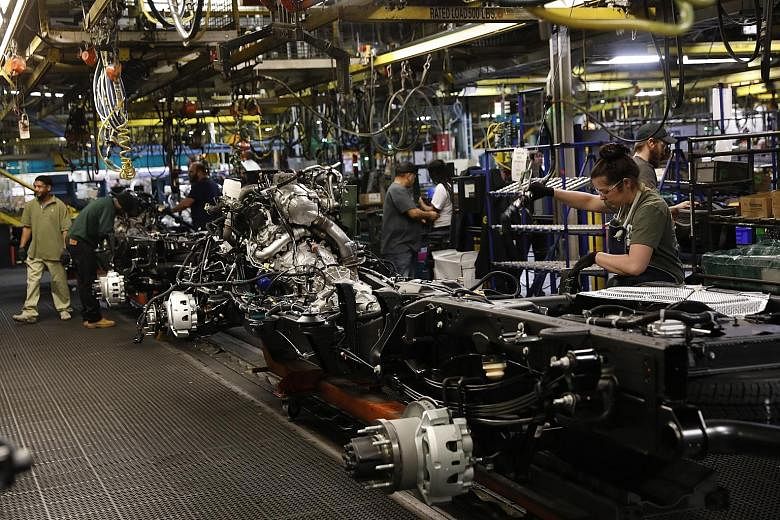 A General Motors plant in the US. Automation is changing the nature of work, flushing workers without a college degree out of productive industries, like manufacturing and high-tech services, and into tasks with meagre wages and no prospect for advan