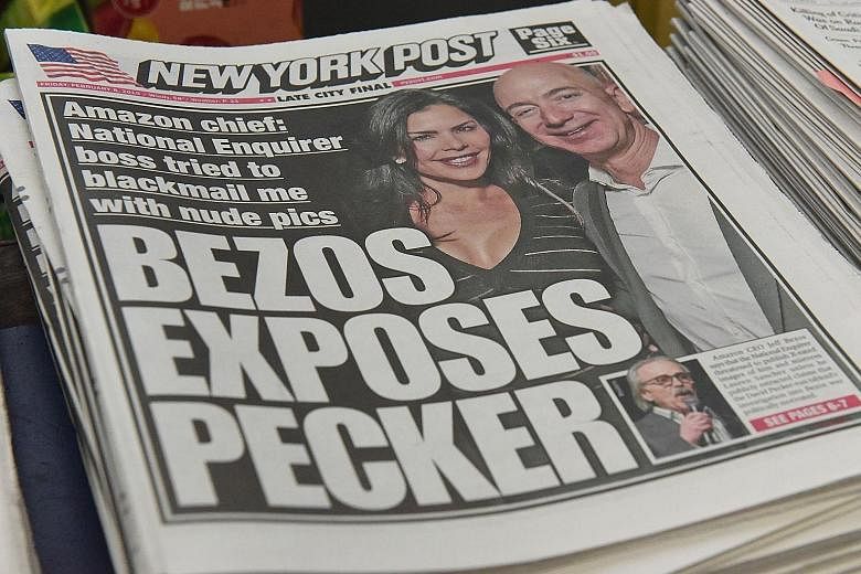 Mr Jeff Bezos and Ms Lauren Sanchez on the front page of the New York Post. Mr Bezos is accusing the National Enquirer's parent company, American Media Inc, which is run by Mr David Pecker, of "extortion and blackmail".