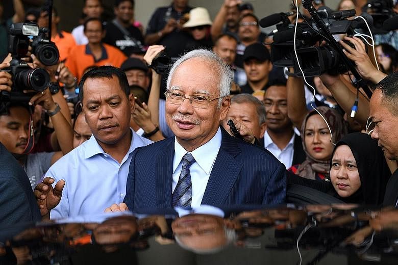 Najib Razak leaving the courthouse in Kuala Lumpur last year after being charged. He and some of his associates are accused of stealing $6.1 billion from Malaysian sovereign wealth fund 1MDB in a mind-boggling scandal that played a large part in the 