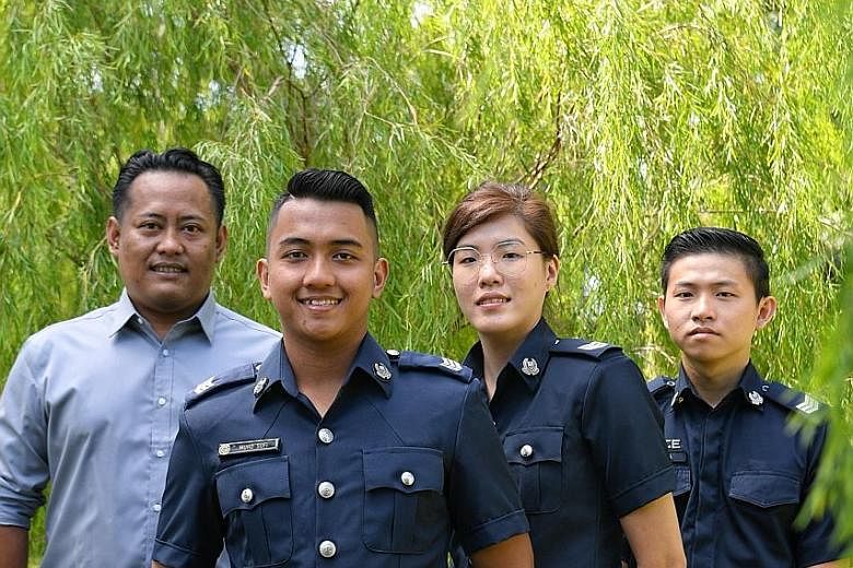 From left: CPG Facilities Management liaison officer Mohammed Adrian Hussein, 39, Sergeant Muhammad Sufi Mohd Hussin, 26, Sergeant Sally Chua, 27, and Sergeant Mervyn Pea, 24, were among those commended by CPIB yesterday for rejecting bribes.