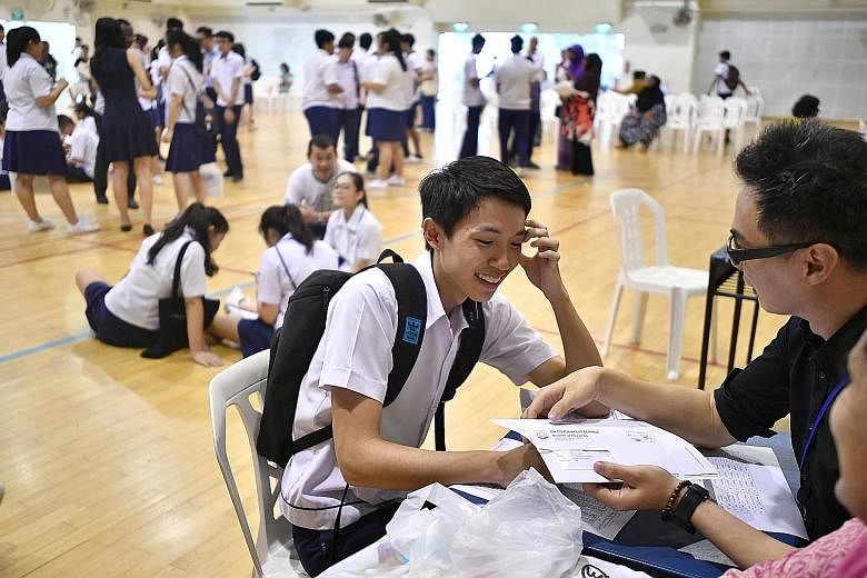 A student collecting his O-level exam results at Serangoon Garden Secondary School last month. On the issue of exam scripts, Education Minister Ong Ye Kung said that by the year end, marking for all GCE exams would be shifted online, so there should 