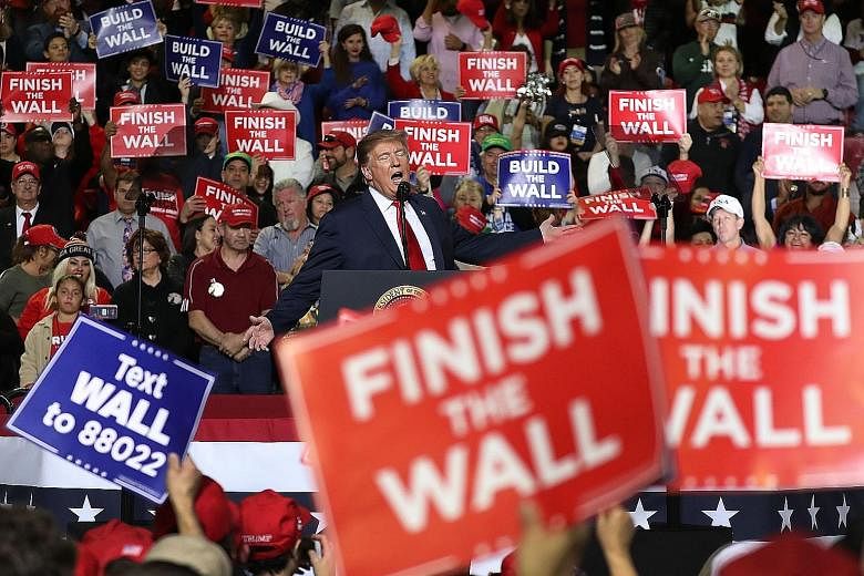 US President Donald Trump at a rally in the El Paso County Coliseum on Monday in El Paso, Texas. Mr Trump continues to press for a wall to be built along the southern border but aides say the tentative deal did not contain the US$5.7 billion (S$7.7 b