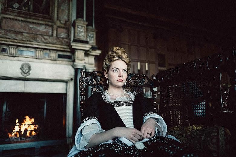 Actress Emma Stone (above) in The Favourite.
