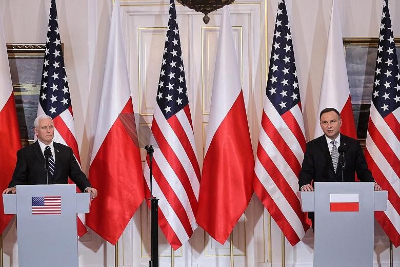 Polish President Andrzej Duda (far right) and US Vice-President Mike Pence addressing the press in Warsaw on Wednesday. Fuelled by concerns that Huawei products could be used by China for espionage, the US has been convincing its allies to exclude te
