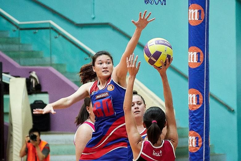 Mission Mannas defender Shina Teo attempting a block during the M1 Netball Super League final loss to Blaze Dolphins last year. The new season begins tomorrow with an emphasis on youth development.