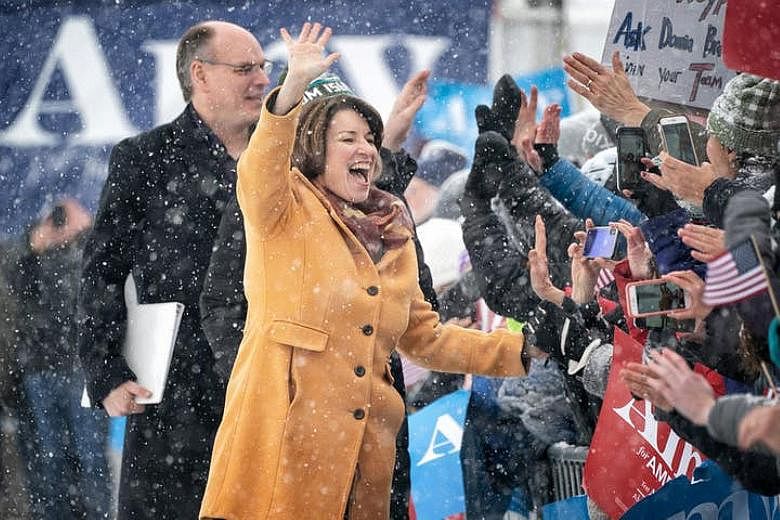 US Senator Amy Klobuchar waving to supporters after announcing her decision to run in the 2020 presidential election at Boom Island Park. She was the fifth sitting female legislator to announce her candidacy.
