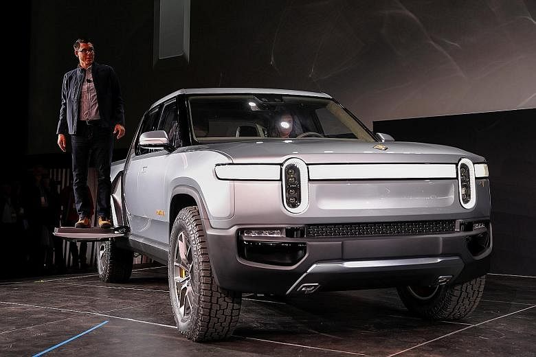 Rivian's CEO R.J. Scaringe introduced his company's R1T all-electric pickup truck at the Los Angeles Auto Show last year.