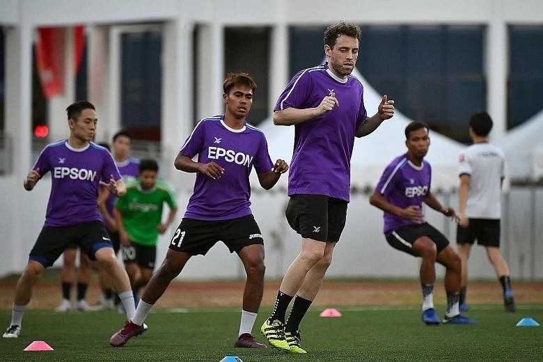 Barry Maguire training with his Geylang teammates at Tampines Meridian JC on Wednesday. He wants to guide and help them to do well for the club.