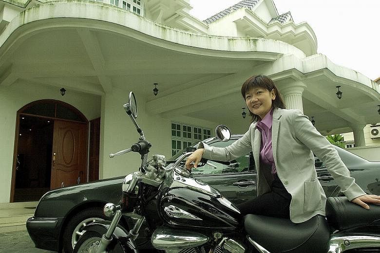 Ms Lum in a 2001 photo. That year, Hyflux launched its initial public offering on the Singapore Exchange's Sesdaq board. The stock rocketed, climbing 131 per cent. By 2005, Ms Olivia Lum had a net worth of over US$240 million, which earned her a plac