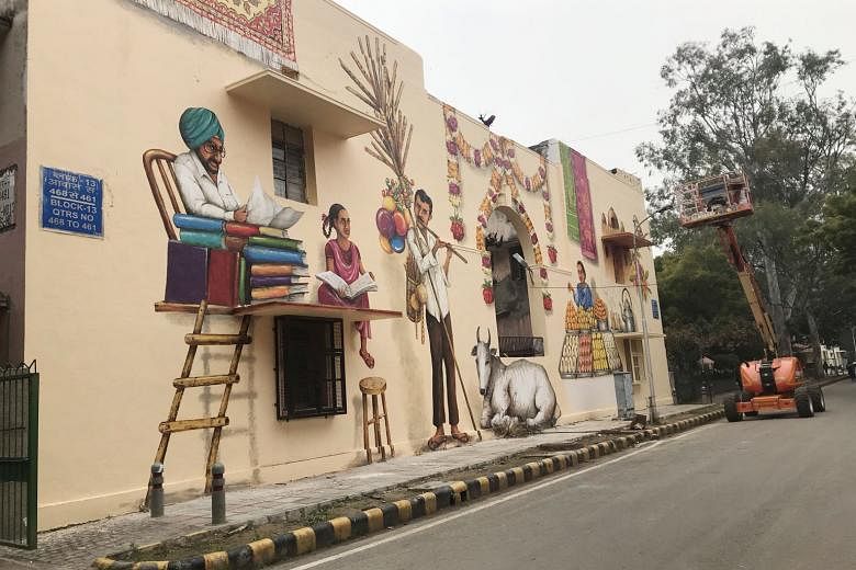 A road in the Lodhi art district in New Delhi has been converted into "Singapore Lane" by the Republic's street artists as part of a three-day festival to promote travel to Singapore.