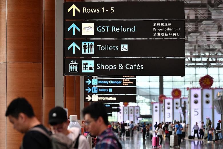 Disparities in the usage of Tamil across Chang Airport's various terminals seem to suggest an inconsistency. In Terminals 2 (left) and 4, directional signs are in all four official languages - English, Chinese, Malay and Tamil - as well as in Japanes