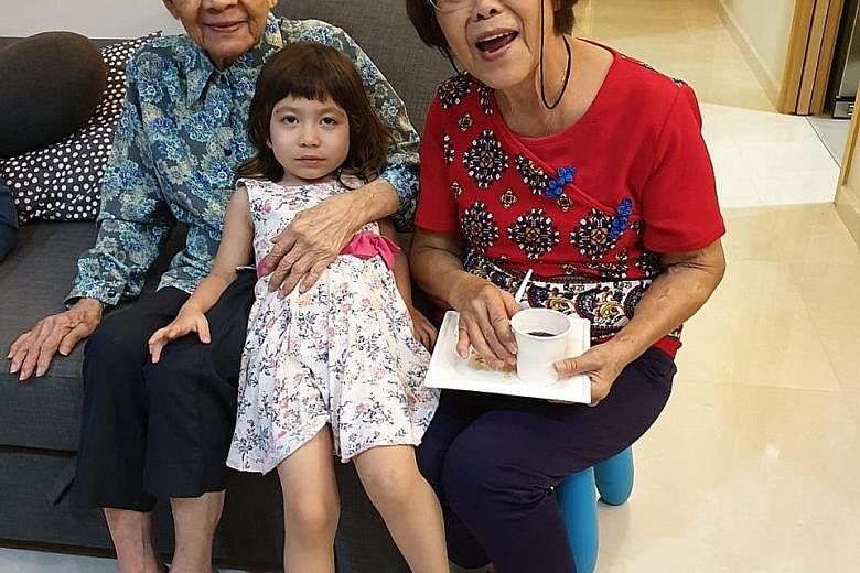 Madam Margaret Yeo with her mother, Madam Ng Guan Cheng, and her granddaughter, Alyx Raja Poh. Madam Yeo, who does not have space at home for a maid, believes the pilot scheme will be a big help, as long as the nursing home is nearby.