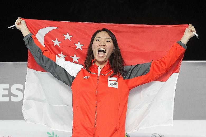 Roanne Ho raising the national flag after winning the 50m breaststroke gold in 31.29sec, a SEA Games record, in Kuala Lumpur 2017.