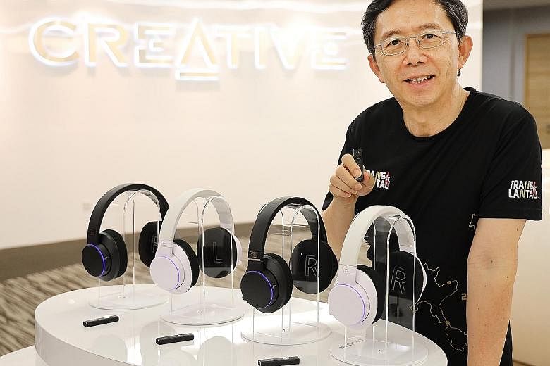 Mr Sim Wong Hoo with Creative's Super X-Fi headphones, which have an award-winning technology that recreates a holographic sound experience. Mr Sim was lauded by Finance Minister Heng Swee Keat for maintaining his entrepreneurial spirit.
