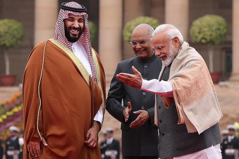 Saudi Arabia's Crown Prince Mohammed bin Salman being welcomed at the New Delhi presidential palace yesterday by Indian President Ram Nath Kovind (centre) and Prime Minister Narendra Modi.