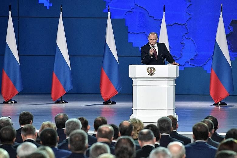 Russian President Vladimir Putin delivering his annual state-of-the-nation address in Moscow yesterday.