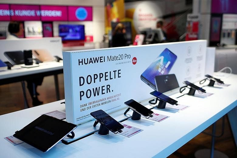 Huawei smartphones at a Deutsche Telekom store in Bonn, Germany. GSMA, a London-based wireless industry group, had recommended that "governments and mobile operators work together to agree" on a testing and certification regime for Europe.