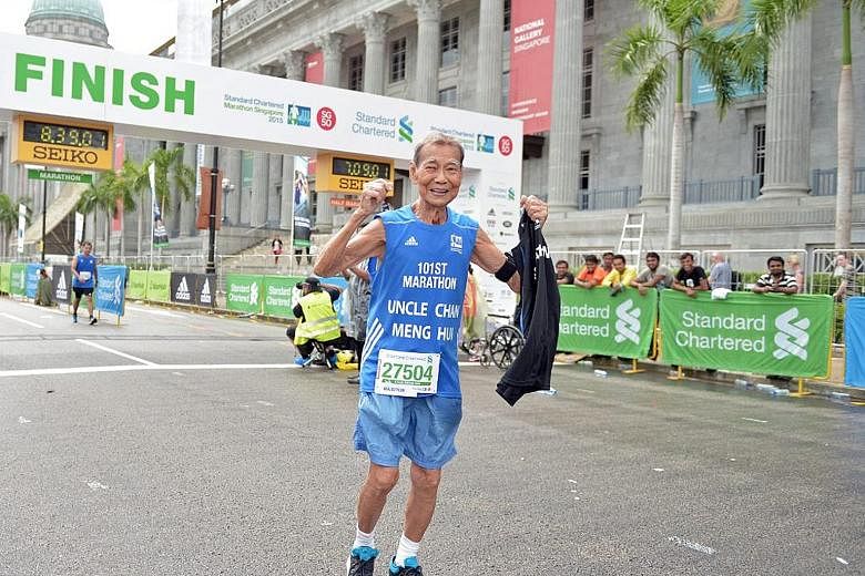 Chan Meng Hui after completing the Standard Chartered Marathon Singapore on Dec 6, 2015. It was his 101st and last marathon.