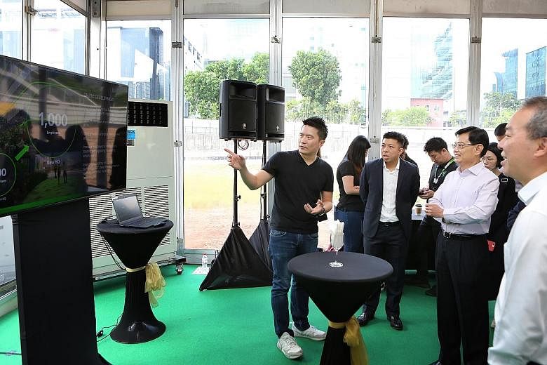 Razer's new 19,300 sq m headquarters in one-north will be managed by Echo Base and serve as a showcase of several building technologies that enhance security and user experience. (From left) Razer CEO Tan Min-Liang and Echo Base managing director Bry