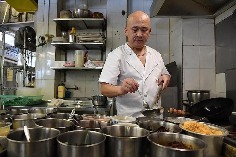 Mr Zhu Shenggang, 45, left Shandong in China to come to work in Singapore 12 years ago so he could earn more money for his children's education. The S Pass holder, who is now a head chef at halal eatery Mak's Place - The Hawkerant, works six days a w