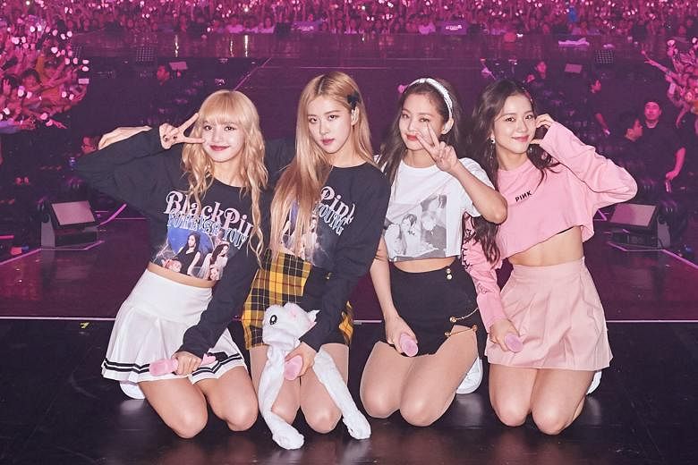 Blackpink members (from left) Lisa, Rose, Jennie and Jisoo at their concert this month. 