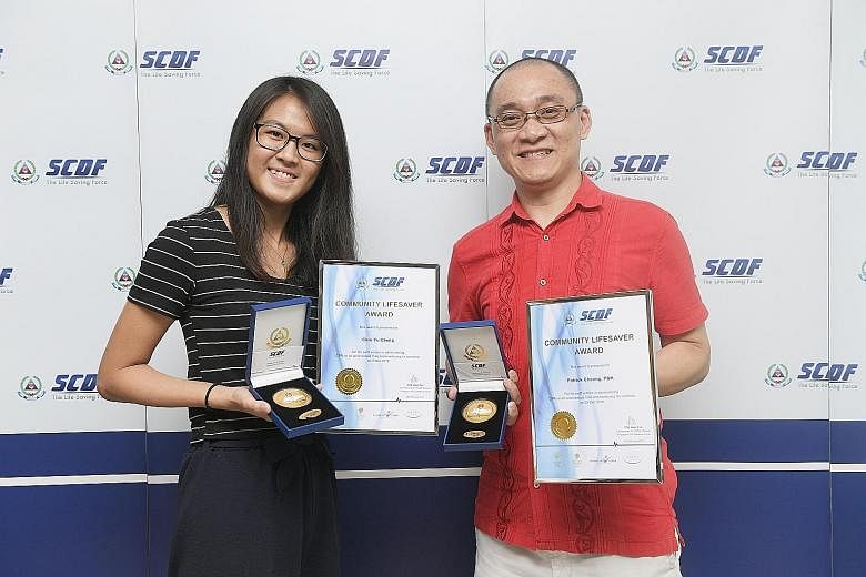 Ms Chiu Yu Cheng, 22, and Mr Patrick Cheong, 46, were awarded the Community Lifesaver Award by the Singapore Civil Defence Force yesterday for saving the lives of two people in separate incidents using cardiopulmonary resuscitation. They are register