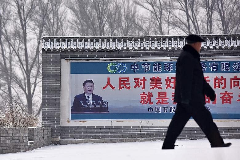 A photograph of President Xi Jinping seen on a propaganda billboard in China's northern Hebei province. A propaganda app that teaches "Xi Jinping Thought" - as Mr Xi's political philosophy is called - has become the most downloaded item on China's Ap