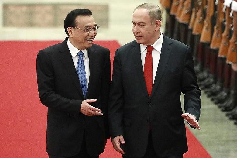 Chinese Premier Li Keqiang welcoming Israeli Prime Minister Benjamin Netanyahu to Beijing in 2017. The two countries are now growing closer and China has become the second most important trading partner for Israel after the US.