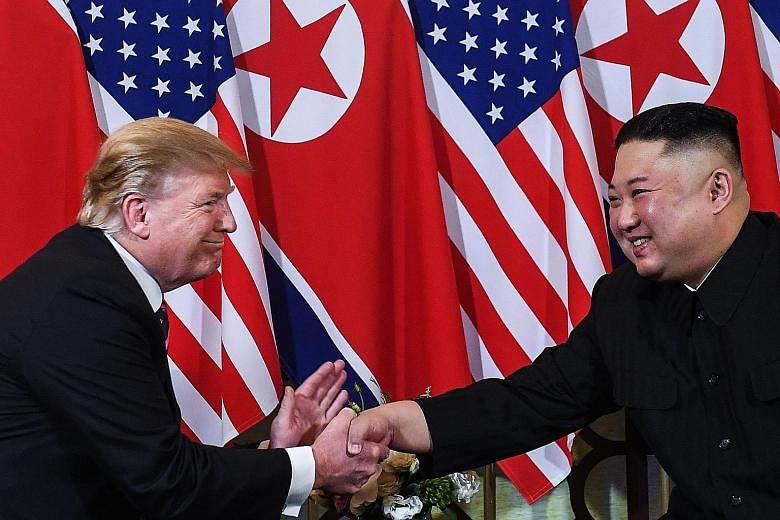 US President Donald Trump and North Korean leader Kim Jong Un in Hanoi yesterday.