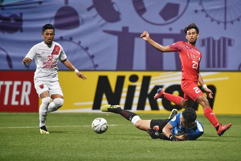 Home United's Adam Swandi attempting a shot at goal during the AFC Cup Group H match against Indonesian side PSM Makassar at the Jalan Besar Stadium yesterday. The match ended 1-1 and Home will play Kaya FC in the Philippines next.