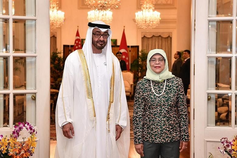 The Crown Prince of Abu Dhabi received a ceremonial welcome at the Istana yesterday morning and paid a courtesy call on President Halimah Yacob, who hosted him to an official lunch.