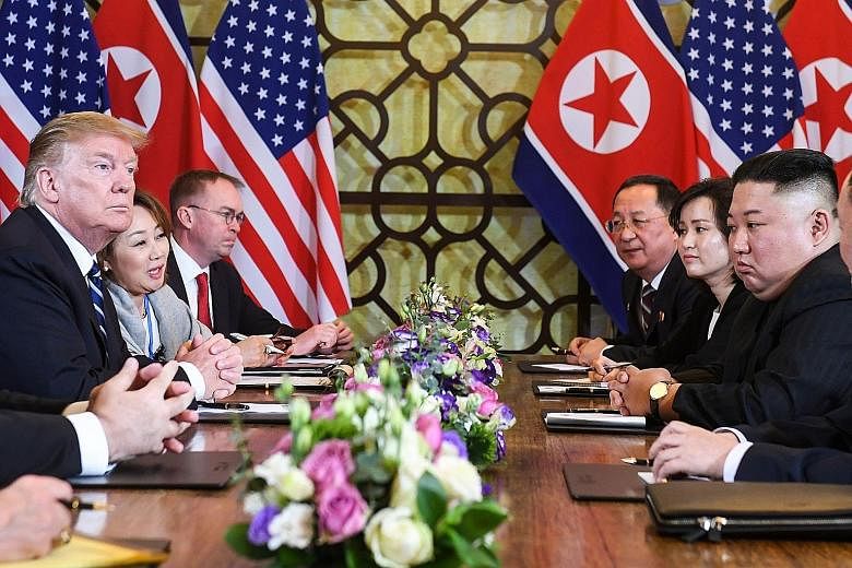 US President Donald Trump and North Korean leader Kim Jong Un at a bilateral meeting at the Sofitel Legend Metropole hotel in Hanoi yesterday. Just the night before, the two men had only praise for each other and optimism of a deal to come the follow