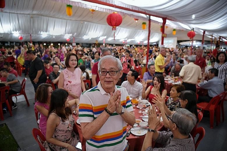 Members of the Merdeka Generation being applauded at the Teck Ghee Chinese New Year dinner in January. Finance Minister Heng Swee Keat yesterday said a cohort-based approach to support the Merdeka Generation and pioneers is appropriate.