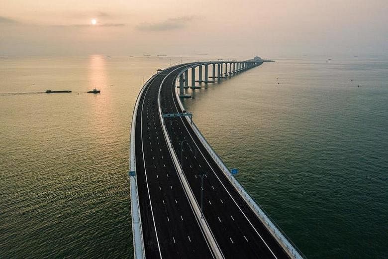 An aerial view of the Hong Kong-Zhuhai-Macau Bridge. China's Greater Bay Area plan includes nine cities in southern Guangdong province, Hong Kong and Macau. In creating a mega city cluster around the Pearl River Delta area, China aims to create an in