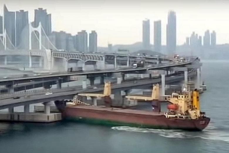 A still from a video posted on social media showing the Russian cargo ship ramming into Gwangan Bridge in the Korean port city of Busan on Thursday.