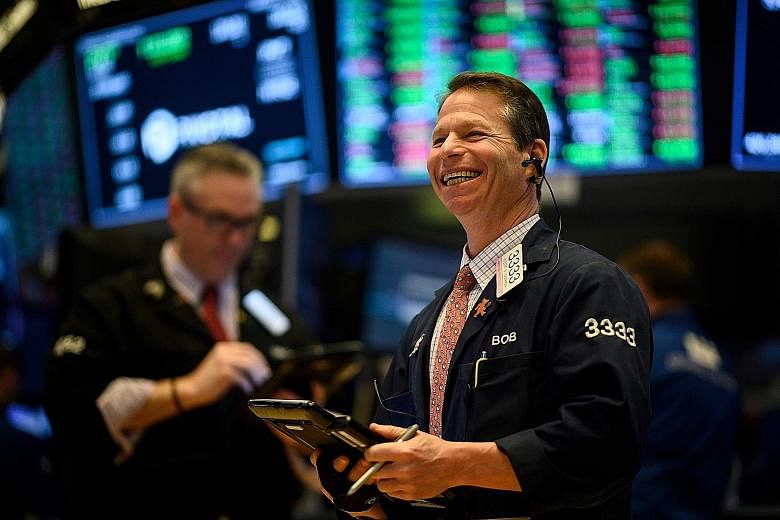 This New York Stock Exchange trader has reason to cheer. With the bullish market momentum going into its ninth straight week of gains, global equity markets have, by now, clocked gains cumulating to an impressive 16 per cent.