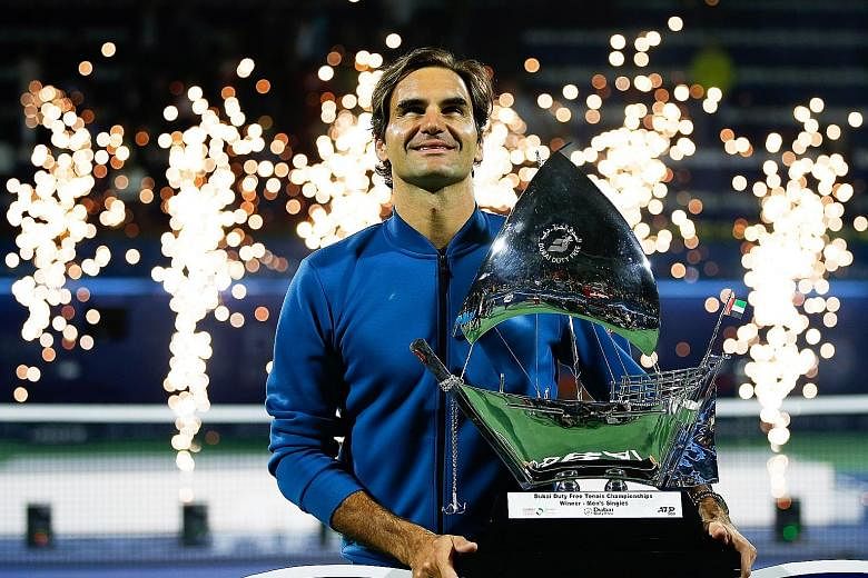 Roger Federer with his trophy after defeating Stefanos Tsitsipas of Greece in the final at the Dubai Championships on Saturday.