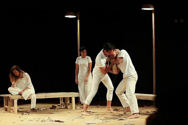 The cast are dressed in white, but as the narrative continues, charcoal wielded by a struggling artist smears and darkens the purity of the characters' clothes.