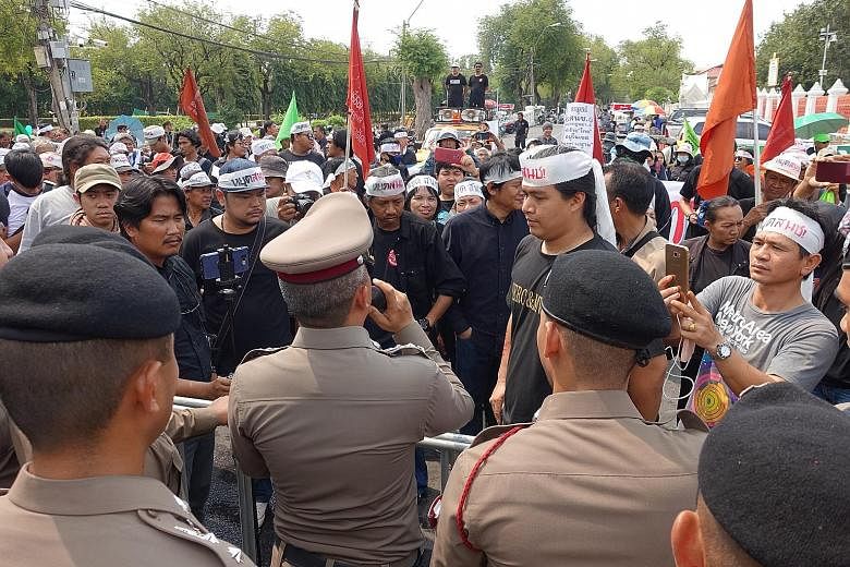 Thai police in a stand-off with protesters in Bangkok last week demanding that lawmakers in Parliament stop work. Ahead of Thailand's March 24 elections, civil rights activists argue that any new laws should be left to the next government. Lawmaker C