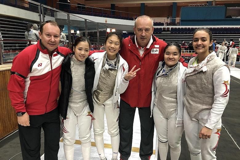 Above, from left: Viacheslav Bobok (foil national partner coach), Tatiana Wong, Denyse Chan, national foil and head coach Andrey Klyushin, Maxine Wong and Amita Berthier are all smiles at the Asian Junior and Cadet Fencing Championships in Jordan. Le