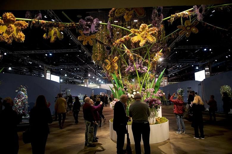 Held at the Pennsylvania Convention Centre, the Philadelphia Flower Show (above). features displays by designers such as Ohio-based Nick McCullough.