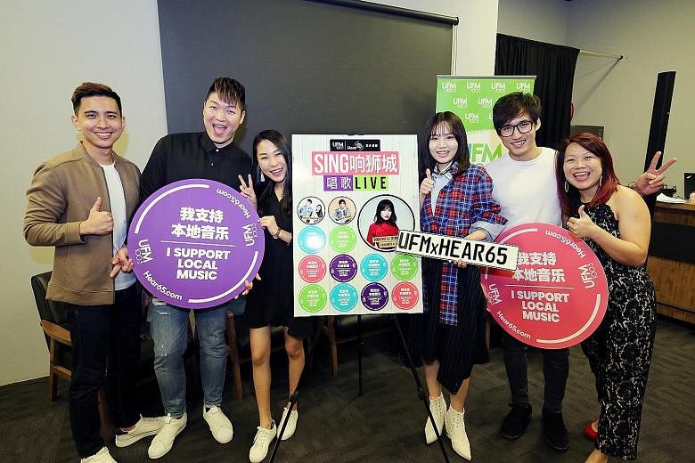 (From far left) UFM100.3 presenter-producer Andrew Zhan; The Cold Cut Duo members Wilson Wong and Gwendolyn Lee; Singaporean singer-songwriter Boon Hui Lu; home-grown musician Marcus Lee Jun Wei; and Ms Christie Ng, UFM100.3's assistant programme dir