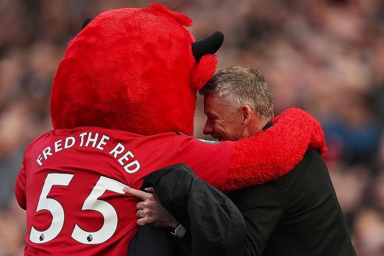 Everybody loves Manchester United interim manager Ole Gunnar Solskjaer, including club mascot Fred the Red.