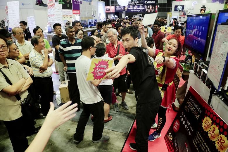 Limited hourly special cards being distributed to the crowd yesterday at the IT Show 2019, now on at the Suntec Singapore Convention and Exhibition Centre. The four-day consumer show, which is into its 18th year, is organised by Singapore Press Holdi