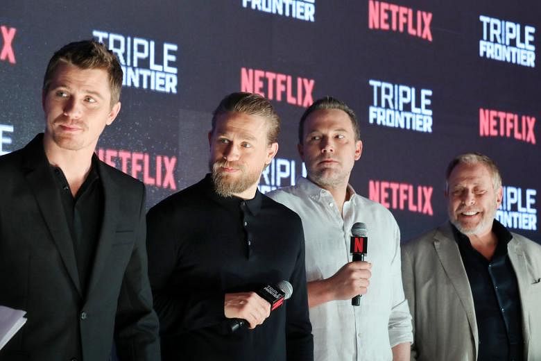 The stars of Netflix action movie Triple Frontier, including Charlie Hunnam (above), were in Singapore yesterday evening to meet hundreds of fans. Actors (from far left) Garrett Hedlund, Hunnam and Ben Affleck, along with producer Chuck Roven, spent 