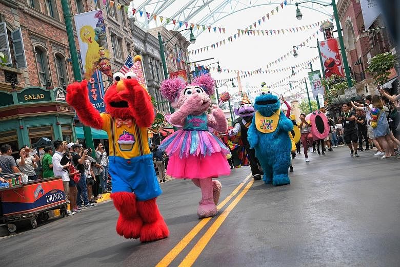 Universal Studios Singapore currently has a thrice-daily, 20-minute-long Sesame Street Birthday Blowout Show featuring characters such as (from far left) Elmo, Abby Cadabby, Count von Count and Cookie Monster.