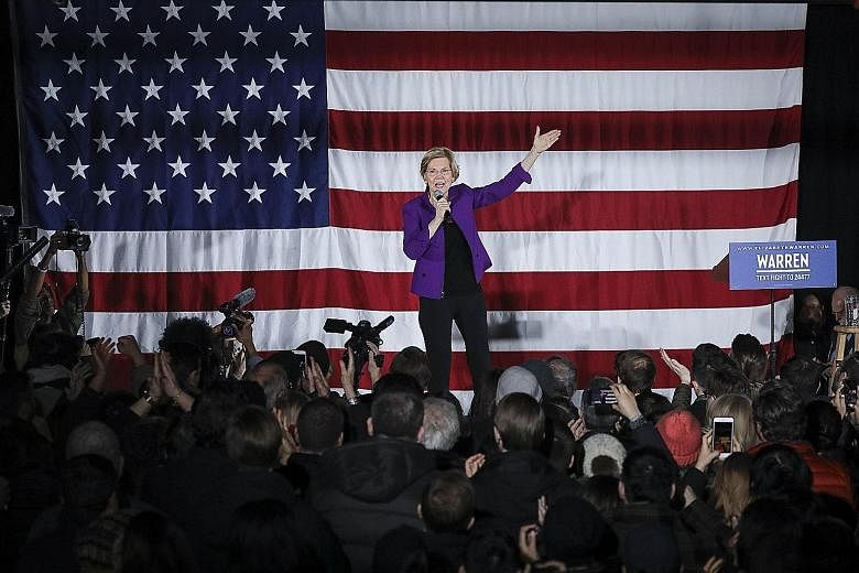 Democratic presidential hopeful Elizabeth Warren speaking before a crowd in Queens, New York City, on Friday.