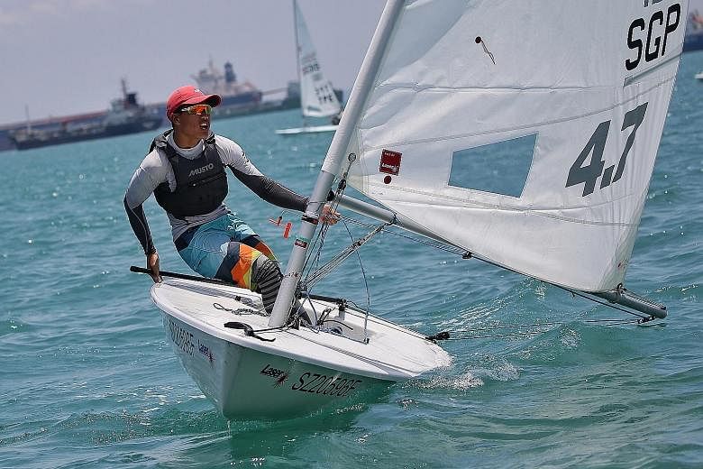 Singapore's Jonathan Lio on his way to third place in the only Laser 4.7 race on the final day of the Asian Open Laser Championships yesterday, to seal victory in the event.